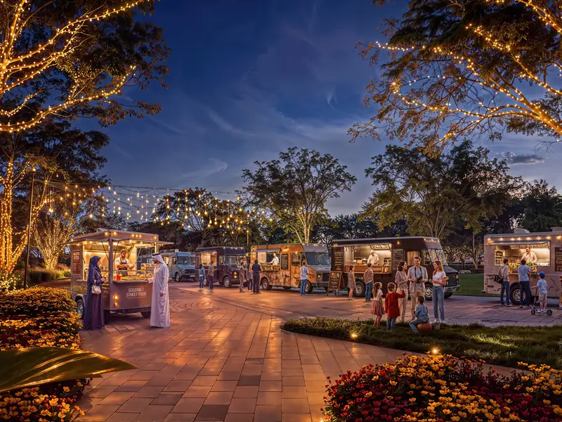 Food trucks under string lights